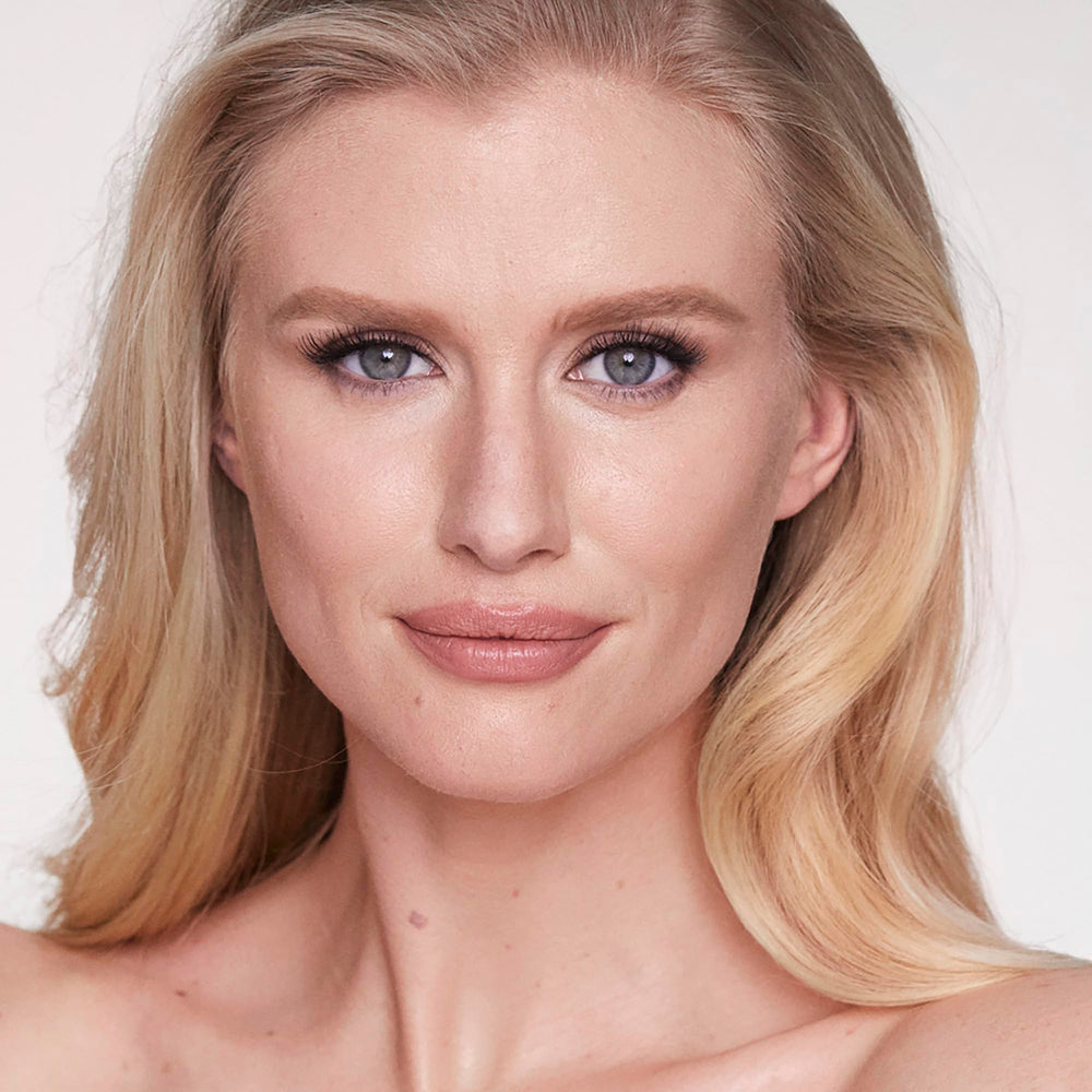Charlotte Tilbury Airbrush Bronzer pairs with foundation for a cohesive airbrushed look.