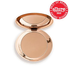 Charlotte Tilbury Airbrush Bronzer showcases silky mica and hyaluronic acid for a smooth, hydrated glow.