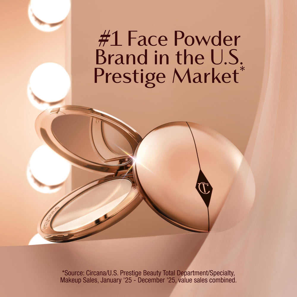 Charlotte Tilbury Airbrush Flawless Finish Powder compact lid demonstrates portable setting for on-the-go touch-ups.