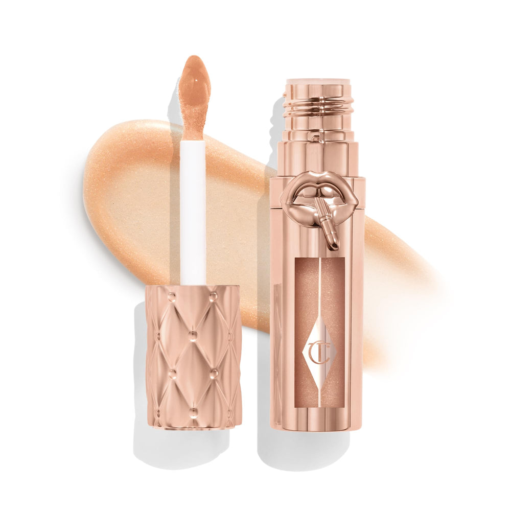 Charlotte Tilbury Big Lip Plumpgasm Nudegasm Diamonds application close-up shows precise, fuller-looking lips