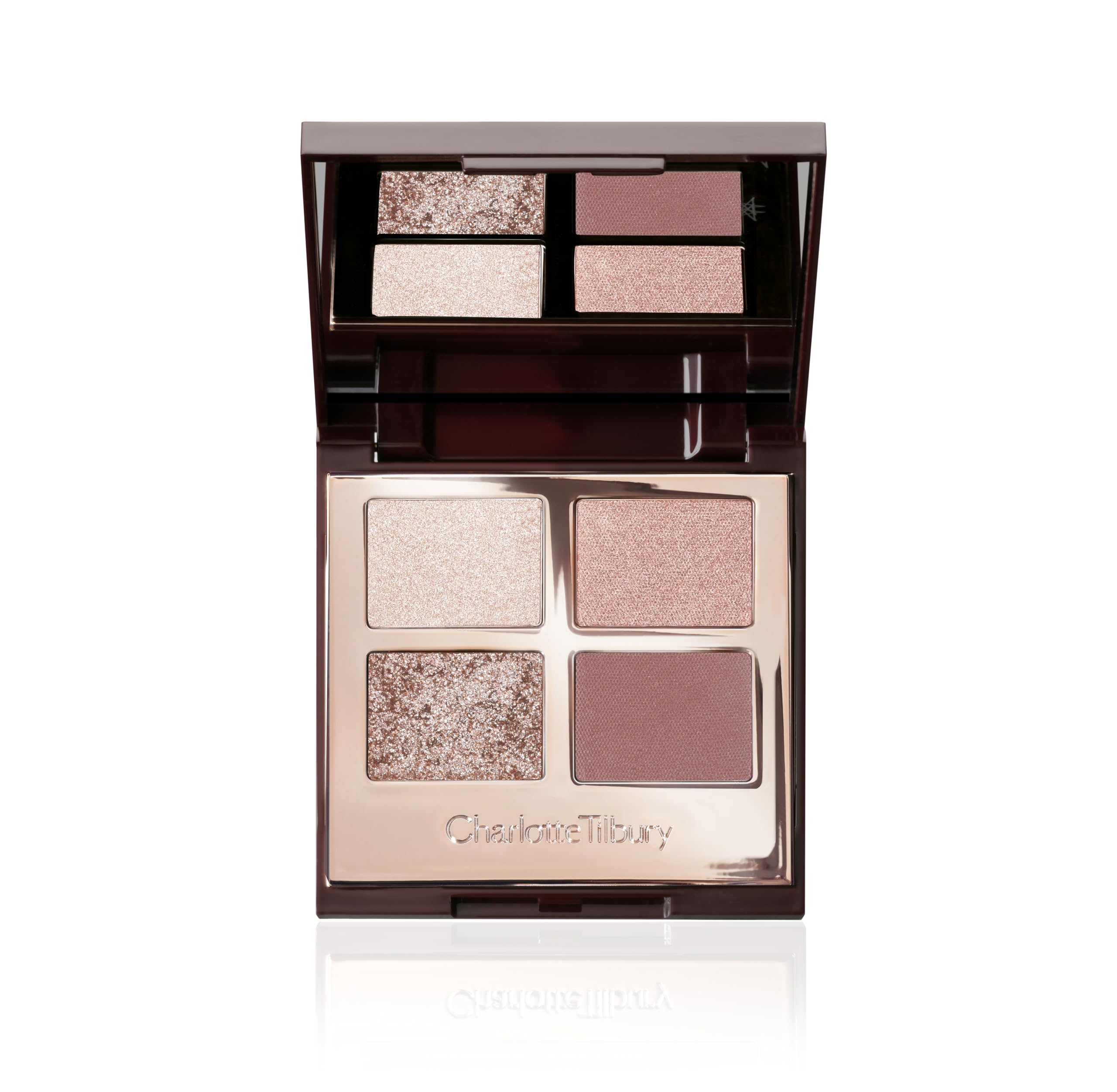Charlotte Tilbury Exagger-Eyes ivory-cream shade brightens the lid for subtle daytime glow.