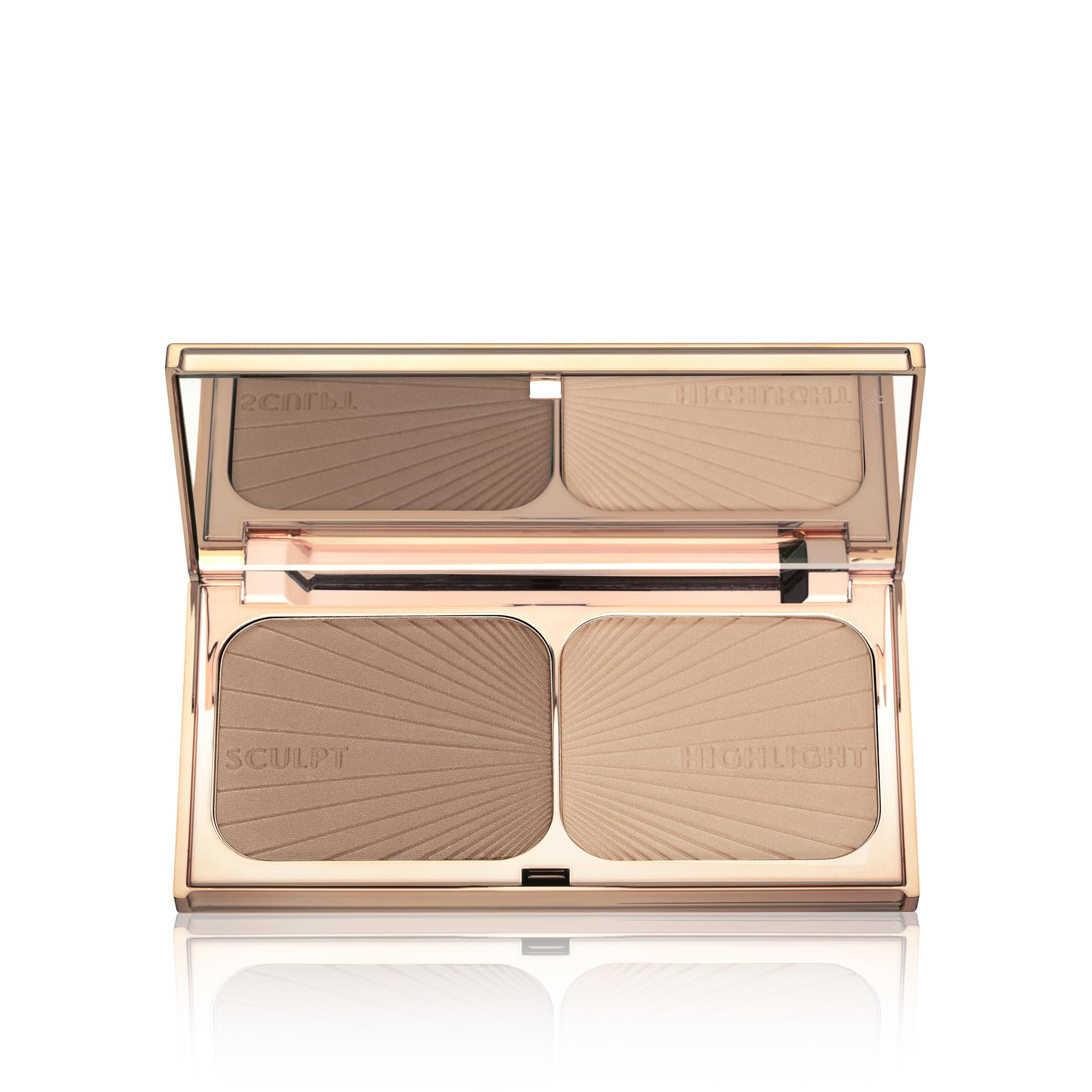 Charlotte Tilbury Filmstar Bronze & Glow highlighter glow on cheekbones.