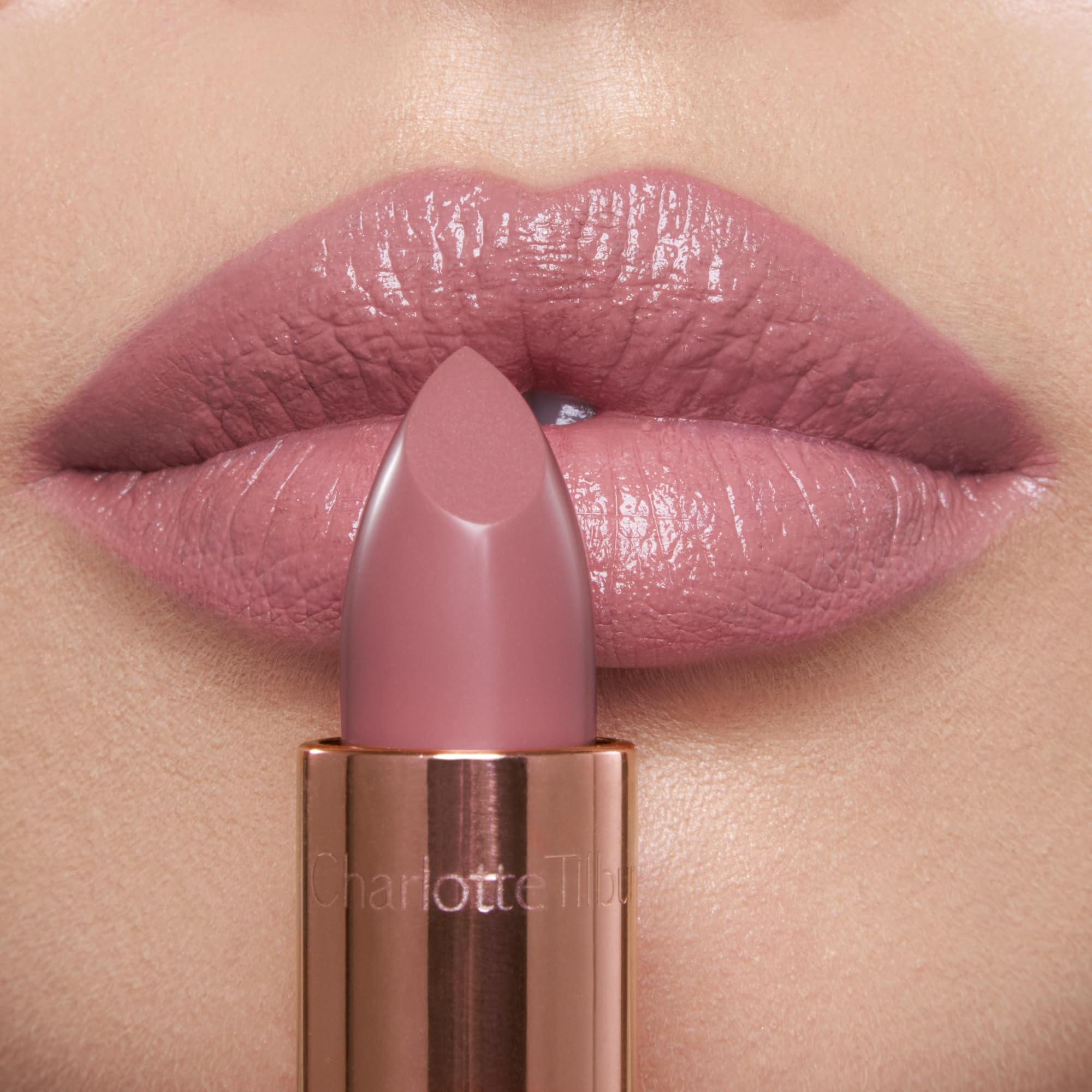 Charlotte Tilbury Pillow Talk Fair lip color in sleek tube ideal for everyday wear.