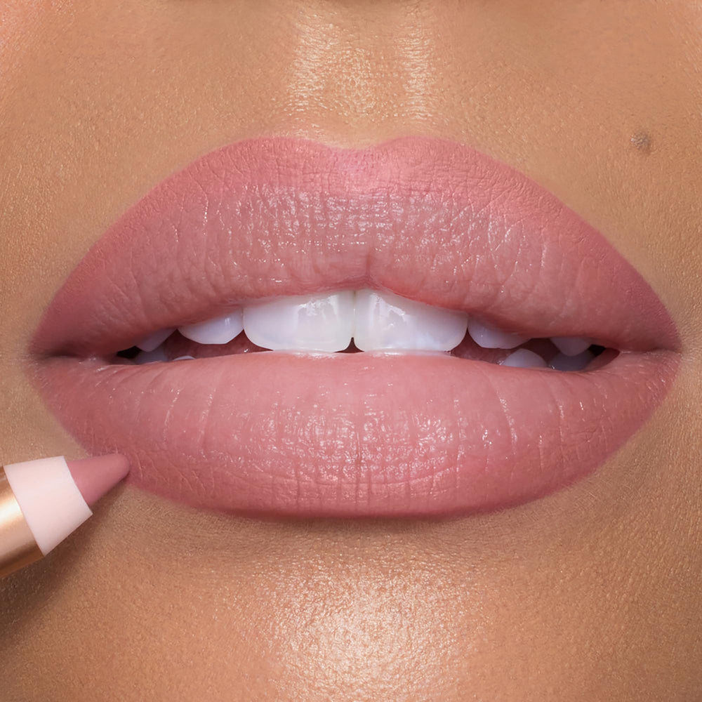 Outline and fill technique to create a fuller-looking pout with Lip Cheat
