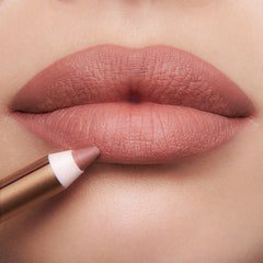 Charlotte Tilbury Lip Cheat Icon Baby waterproof swatch resists smudging.