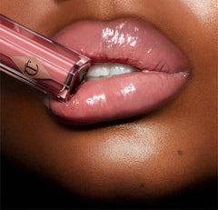 Lip Lustre with lotus extract nourishes and hydrates for smoother, healthier-looking lips.