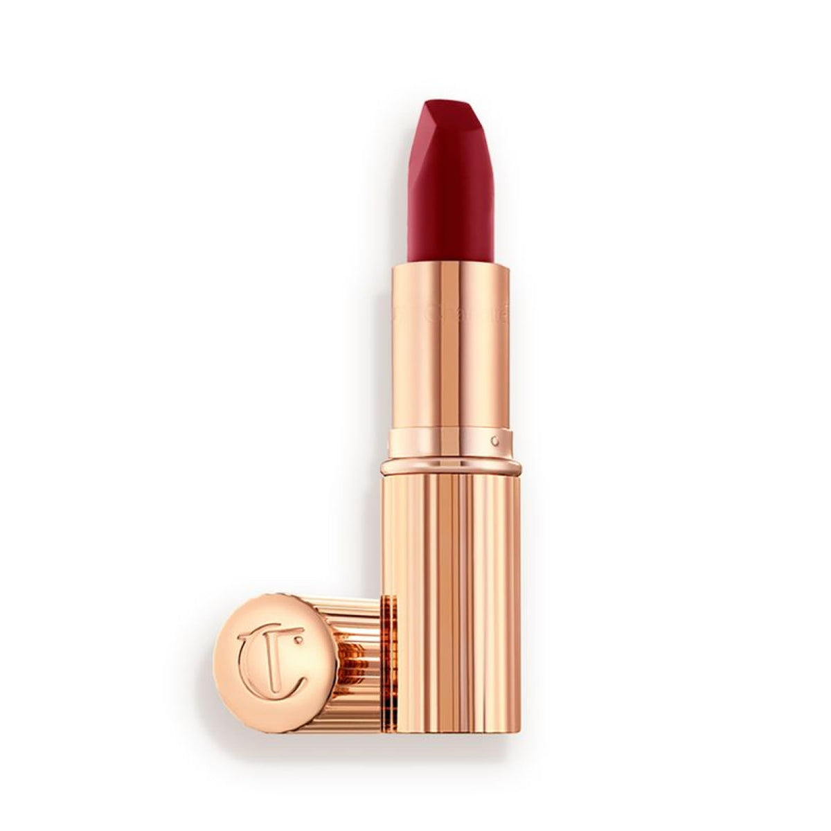Charlotte Tilbury Matte Revolution Walk of No Shame bullet swatch in rich berry-rose shade