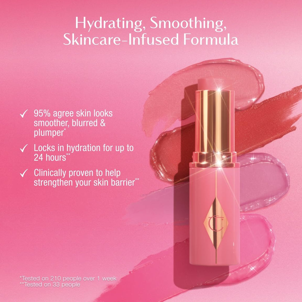 Charlotte Tilbury Unreal Glow Stick applied with fingers for quick, buildable luminosity.