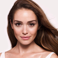 Charlotte Tilbury Wonderglow soft-focus glow highlights textures with dewy luminosity