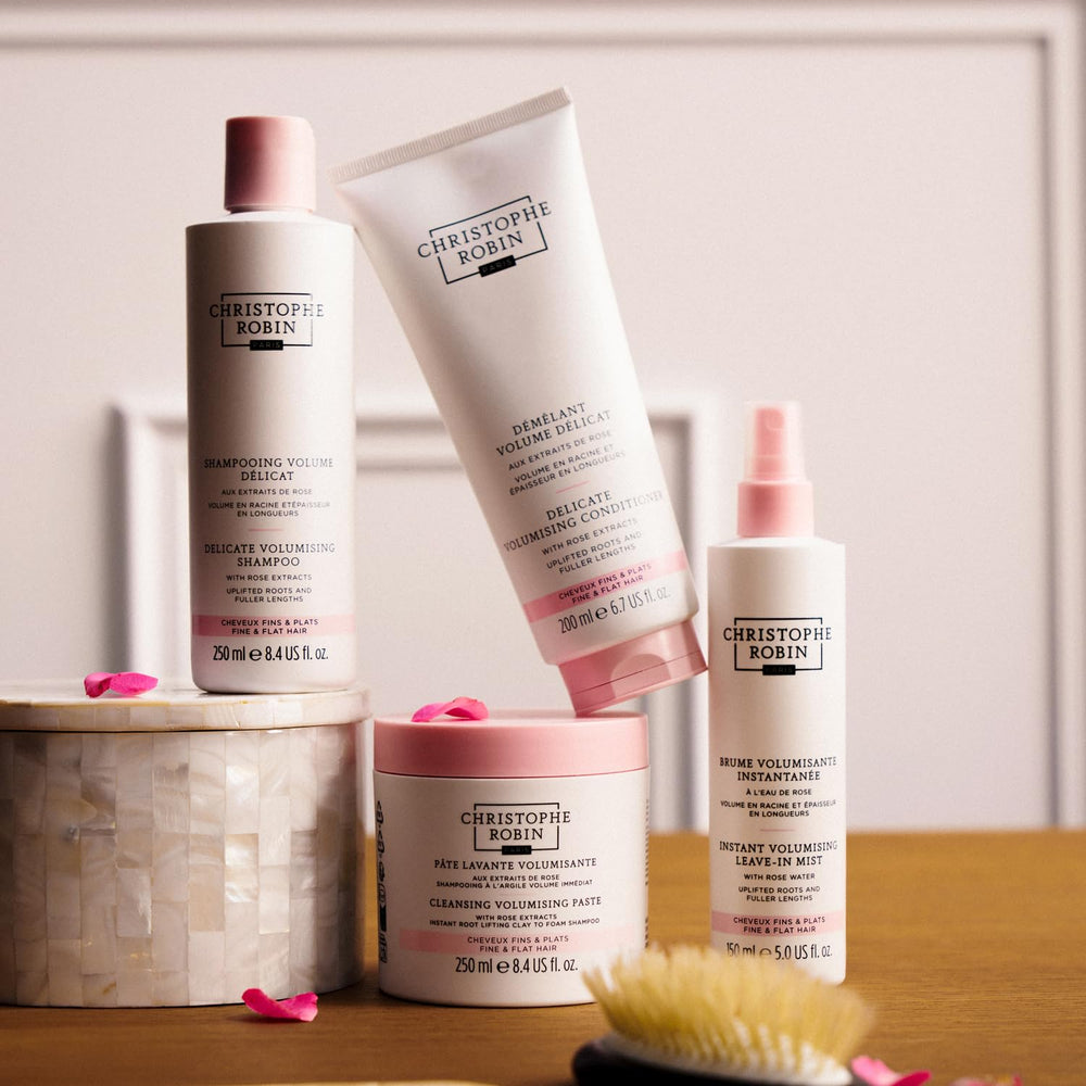 Christophe Robin Delicate Volumizing Shampoo color-protection label signifies color-safe care.