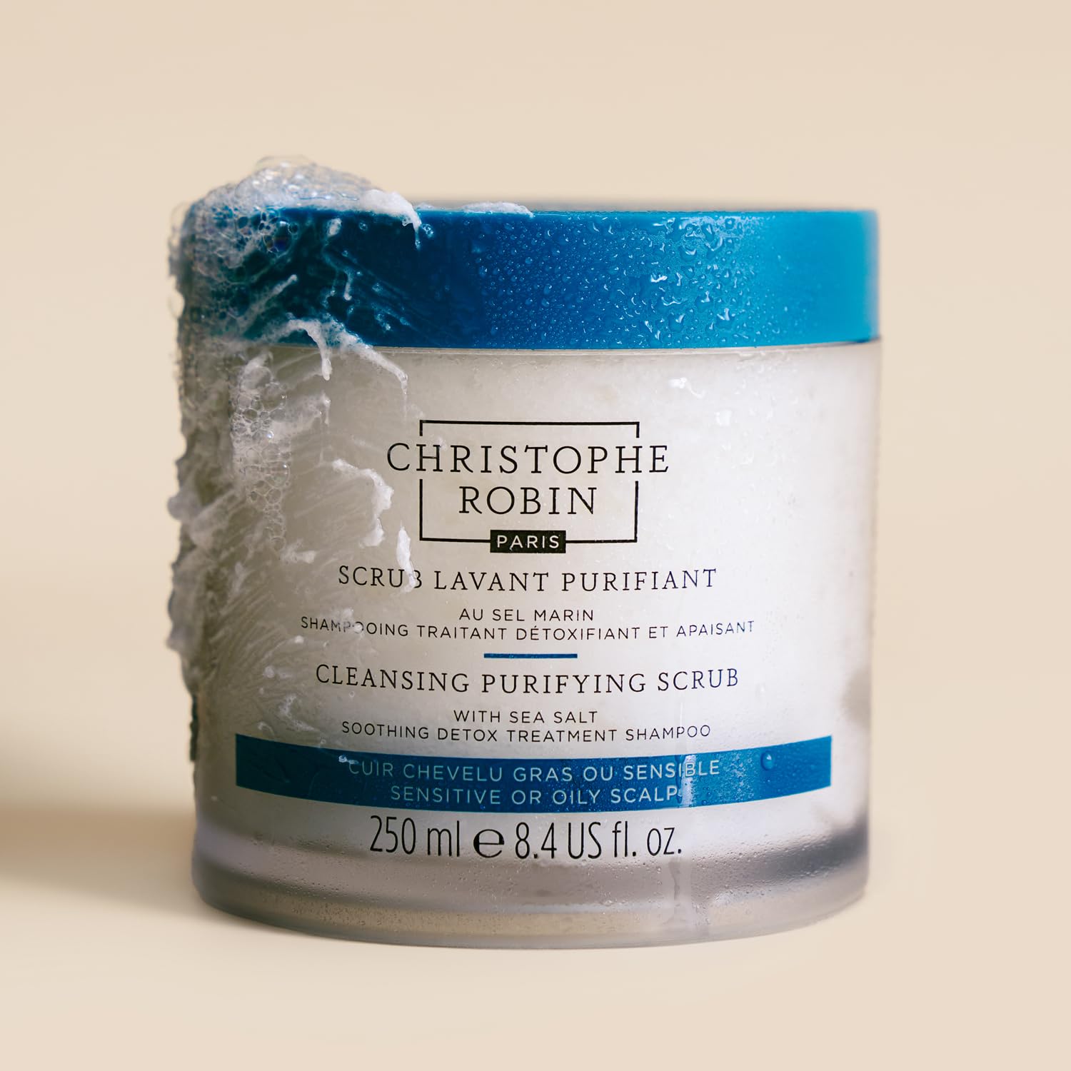 Christophe Robin Purifying Scalp Scrub application shows gentle scalp massage