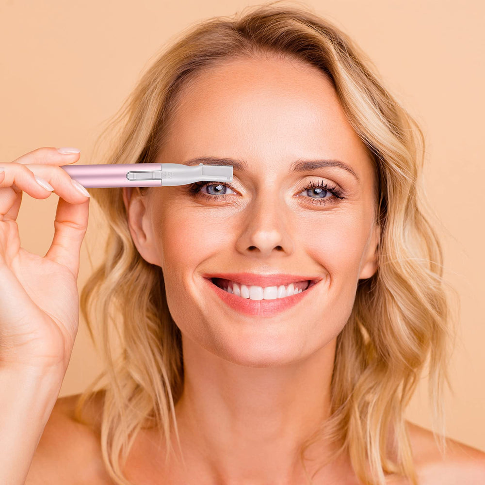 Chumia compact trimmer in use on chin and upper lip.
