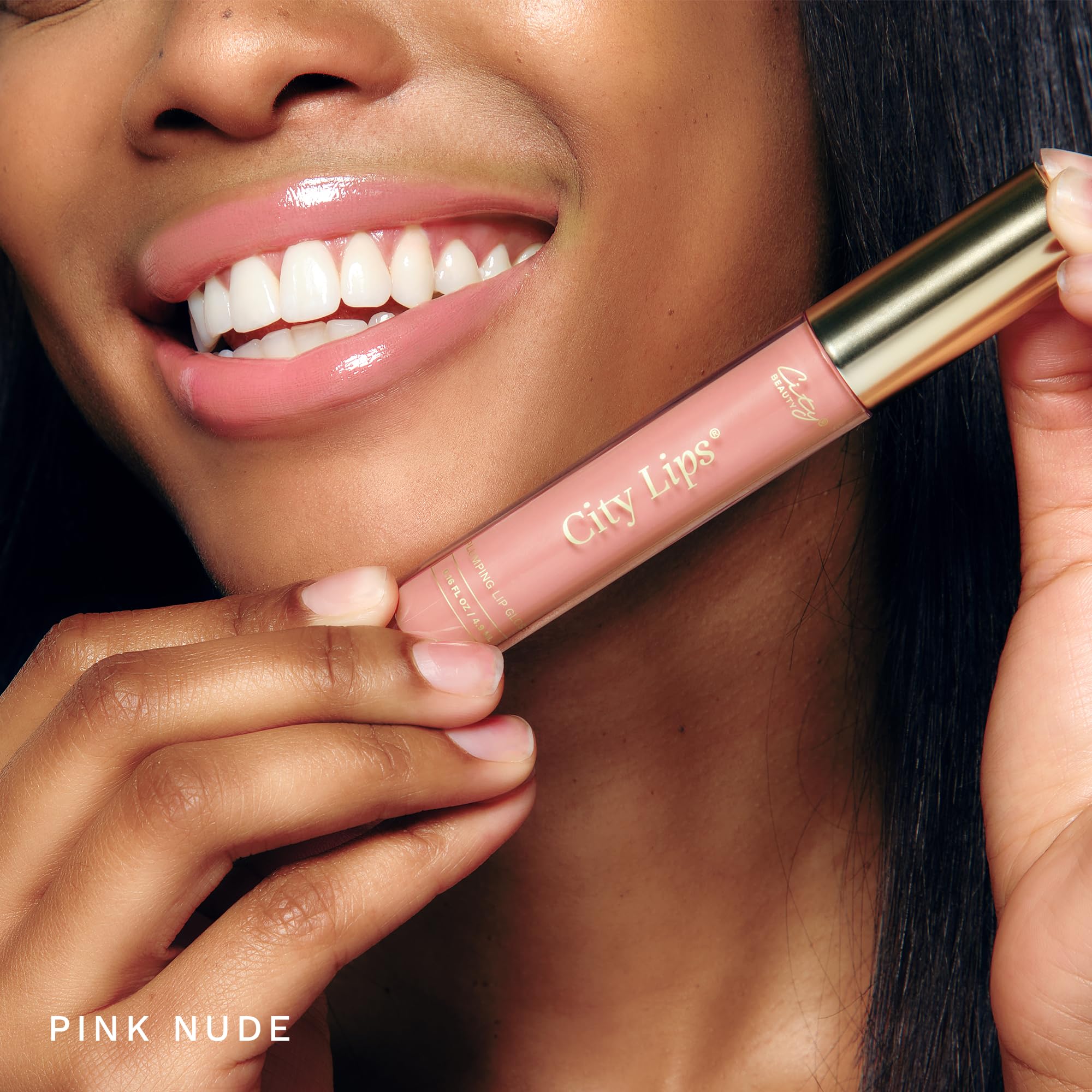 Close-up of City Beauty City Lips Pink Nude gloss on lips