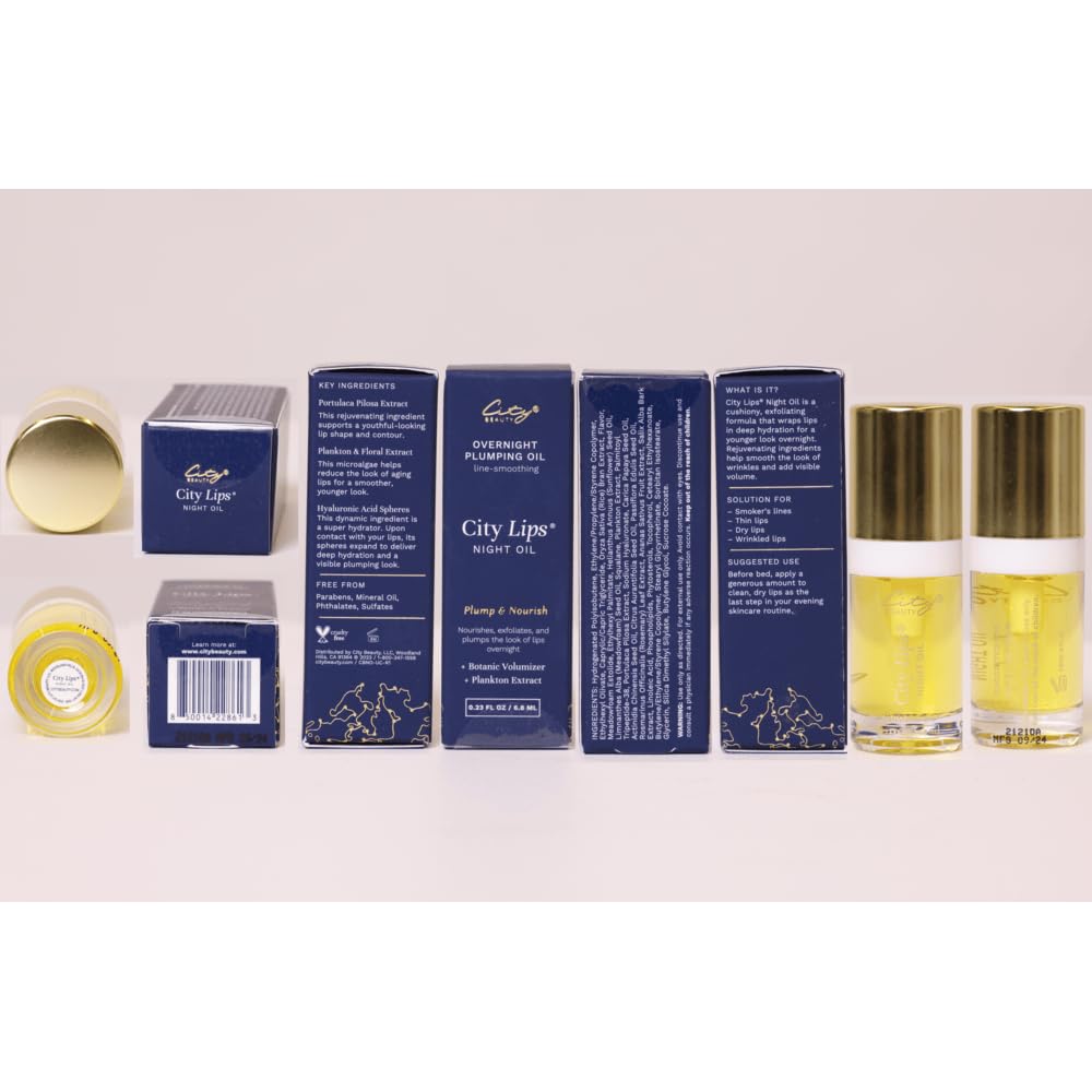 City Beauty City Lips Plumping Oil bottle on pink backdrop emphasizes anti-aging care