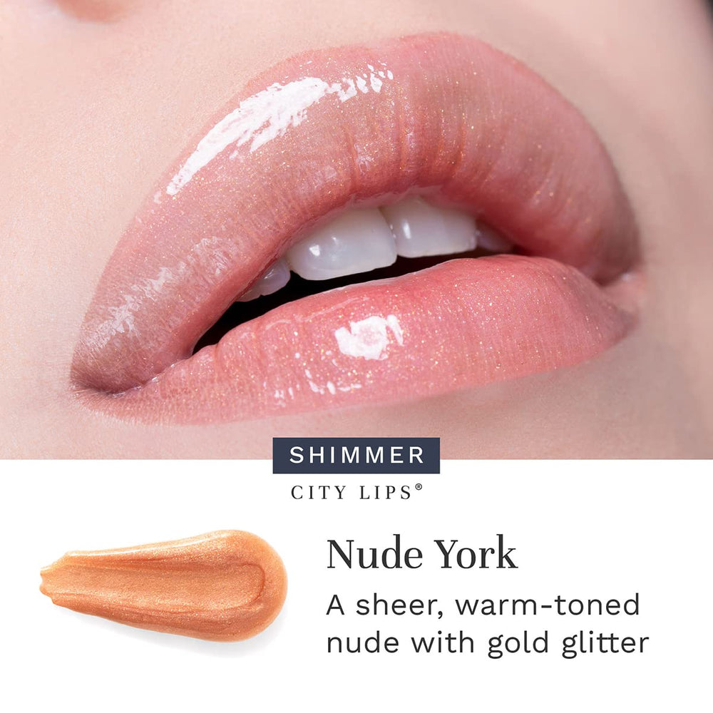 Close-up of City Lips Nude York applying gloss for even coverage.