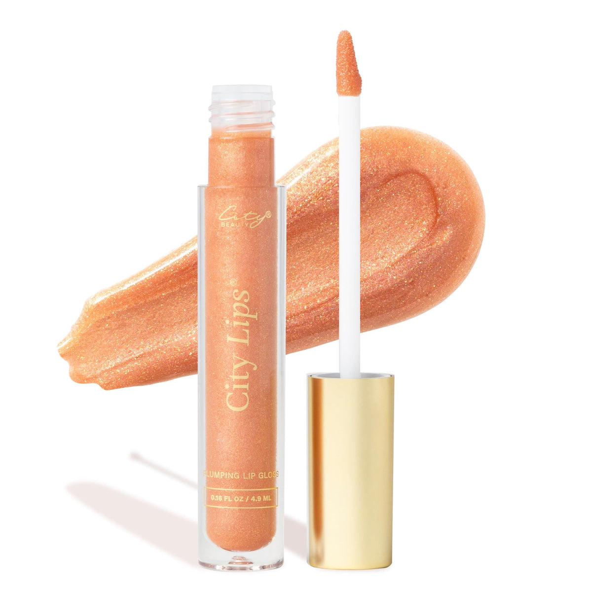 City Lips Nude York gloss tube shows high-shine nude shade with gold glitter.