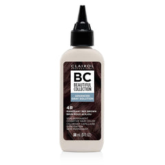 Clairol Professional Advanced Gray Solution bottle pouring for precise gray coverage