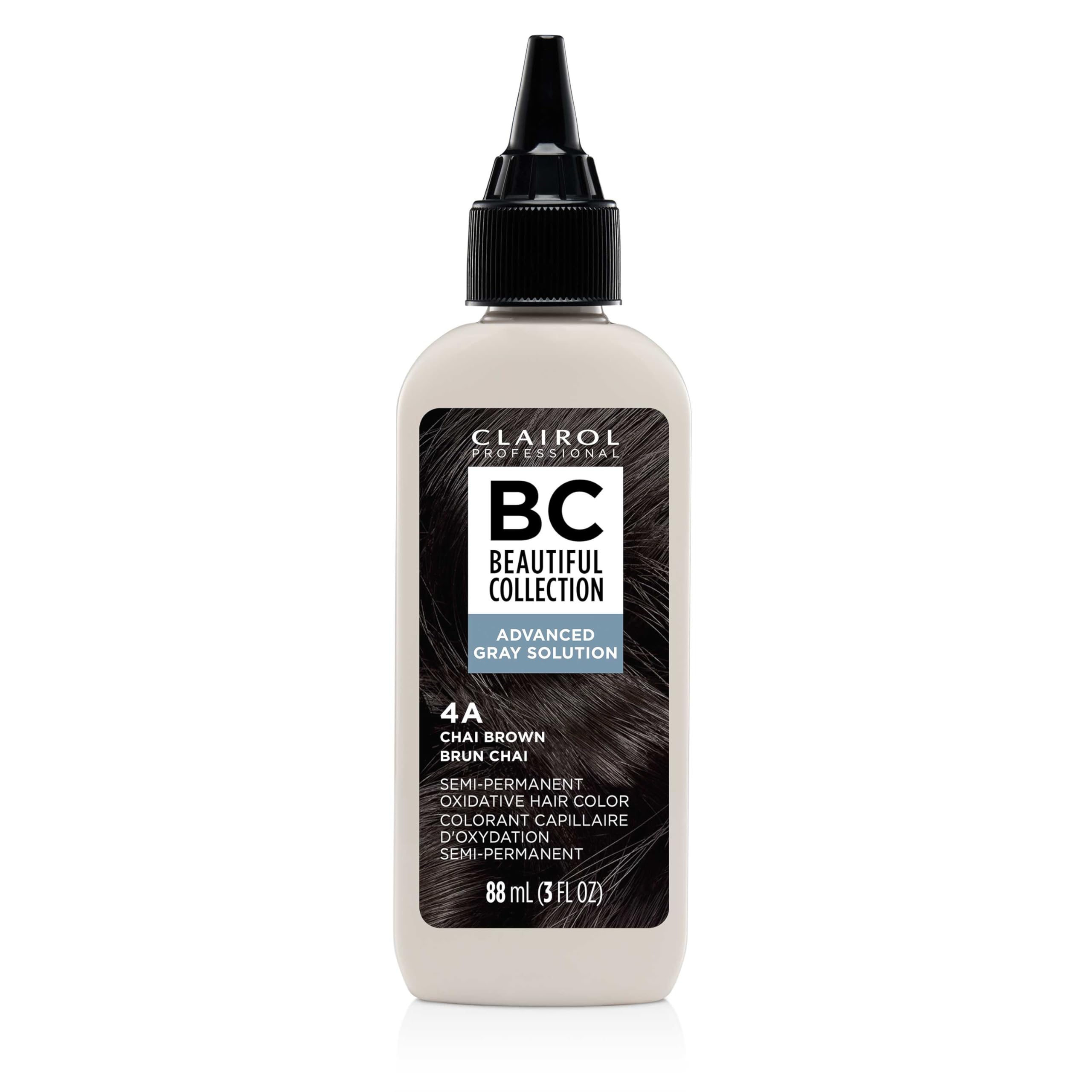Clairol Professional Advanced Gray Solution bottle closeup shows a no ammonia, no peroxide formula for gentle gray coverage.