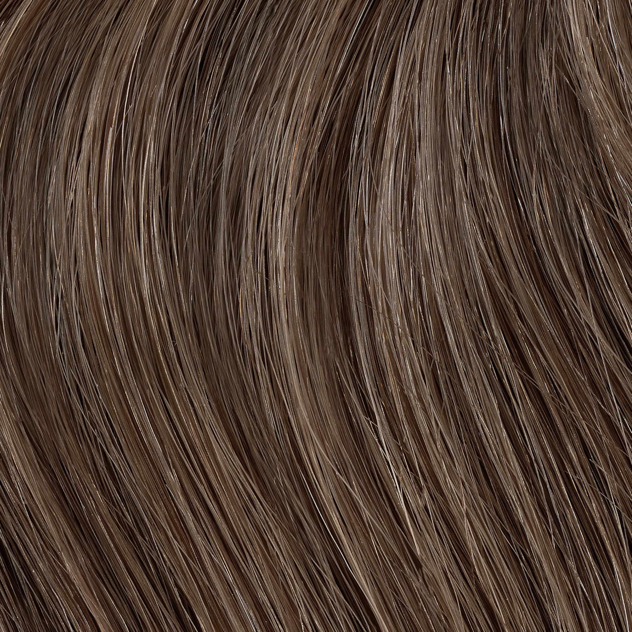 Clairol Professional Creme Permanente color-mix in dish for precise application.