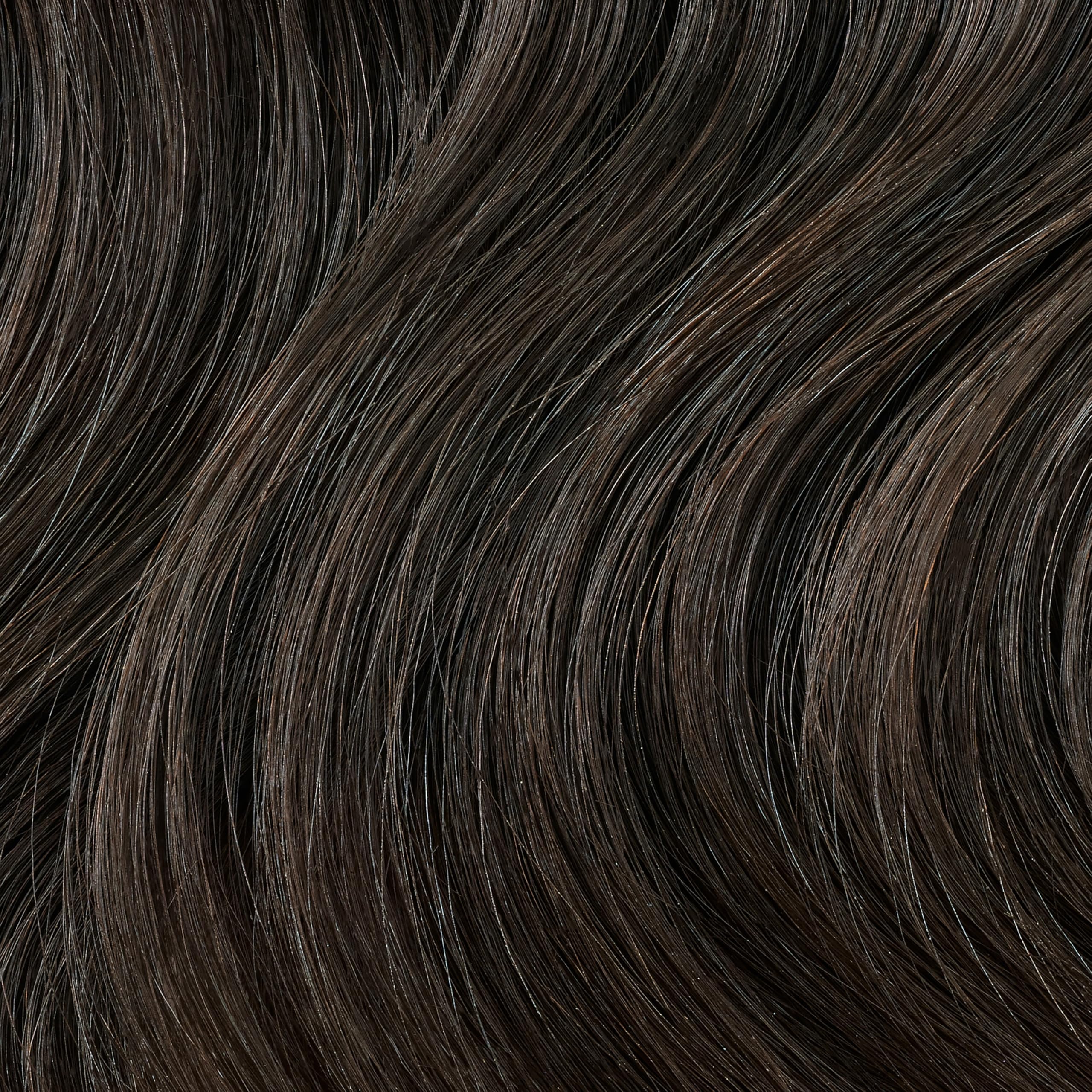 Liquicolor 6NN color cream tube ready for precise application and even tones.