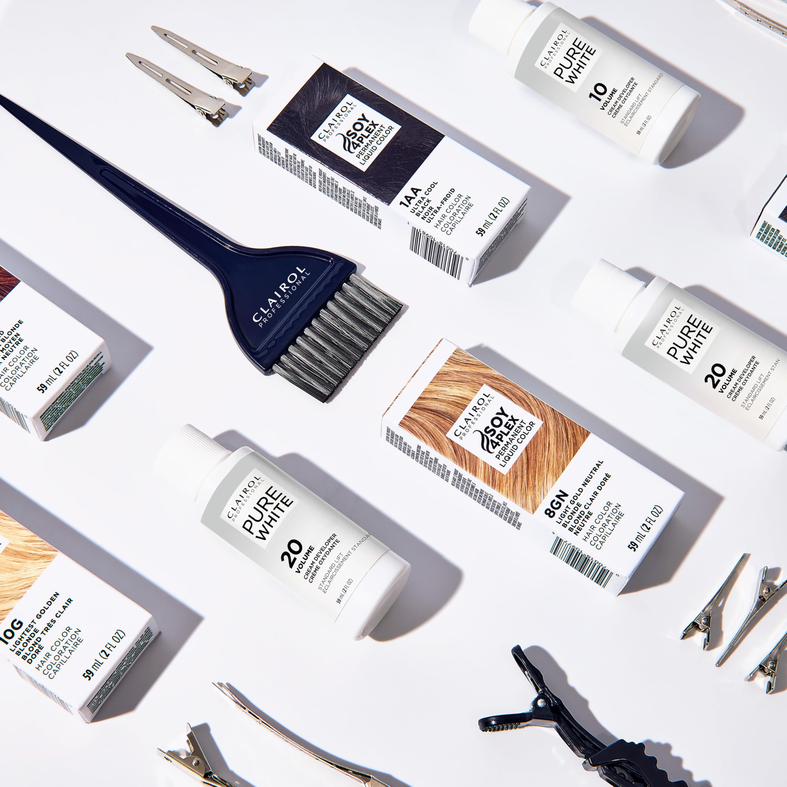 Clairol Professional Liquicolor dye applied to a hair section for rich tone