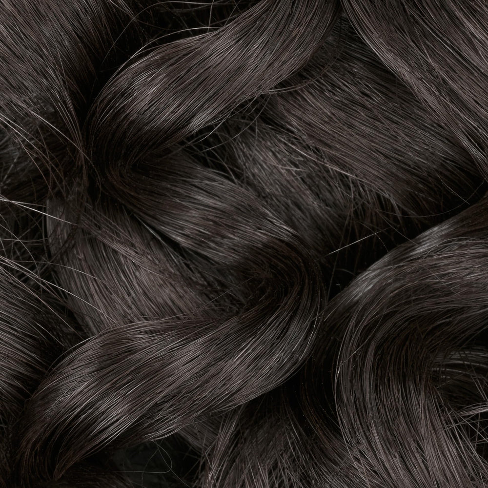 Liquicolor Permanente shade swatches illustrate the neutral brown family and tone range.