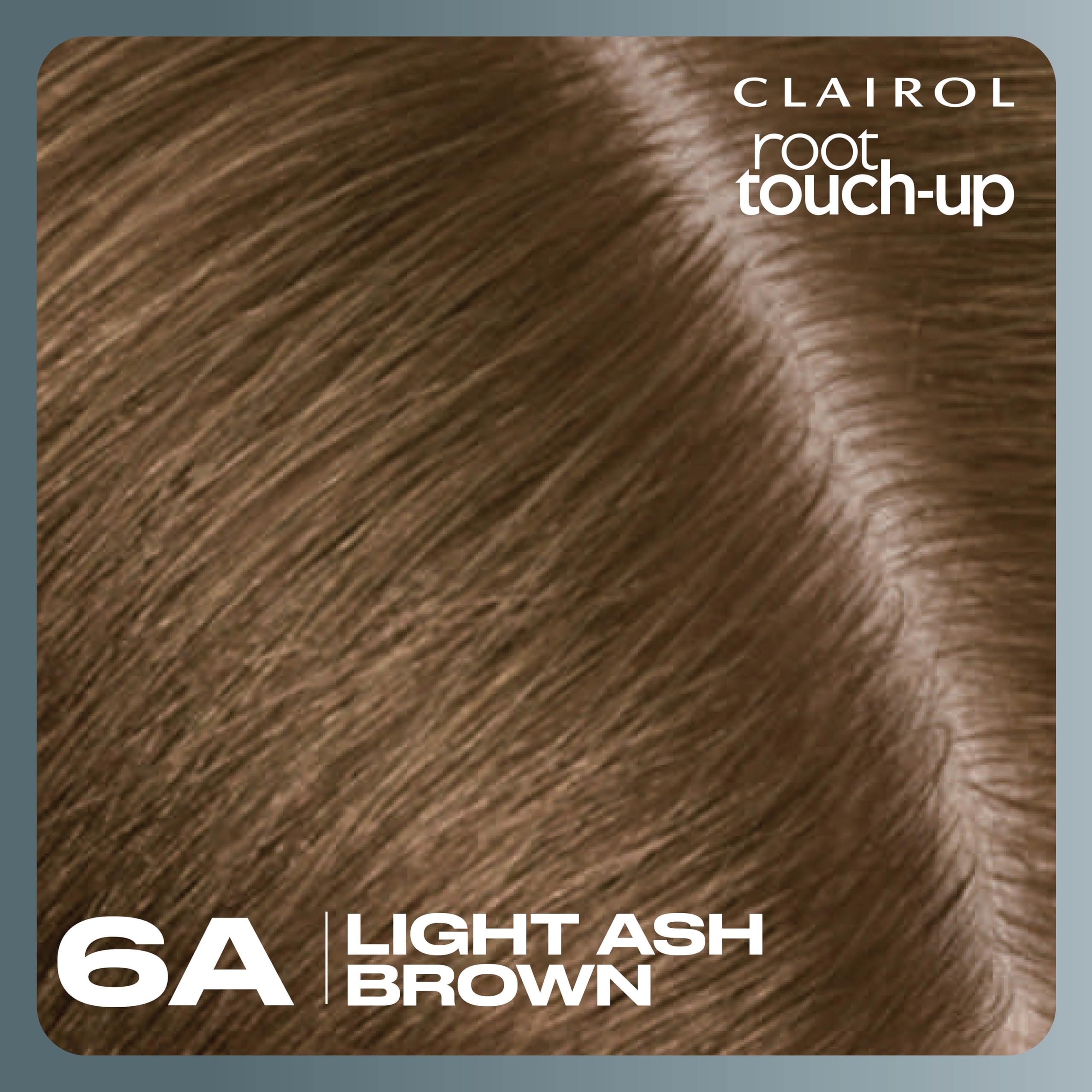 Bathroom counter with Clairol Root Touch-Up ready to use.