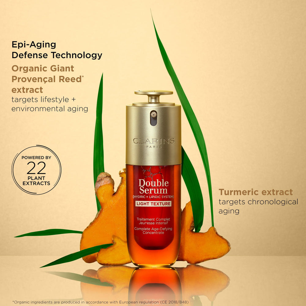 Clarins Double Serum Light Texture face-application demonstrates gentle downward strokes