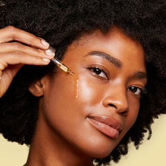 Clarins face oil texture shown as lightweight, easily absorbed.