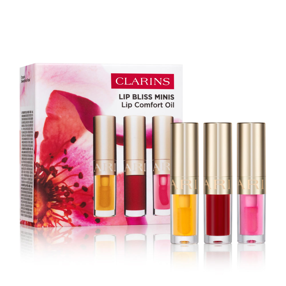 Clarins Lip Comfort Oil Honey swatch delivering sheer shine and hydration