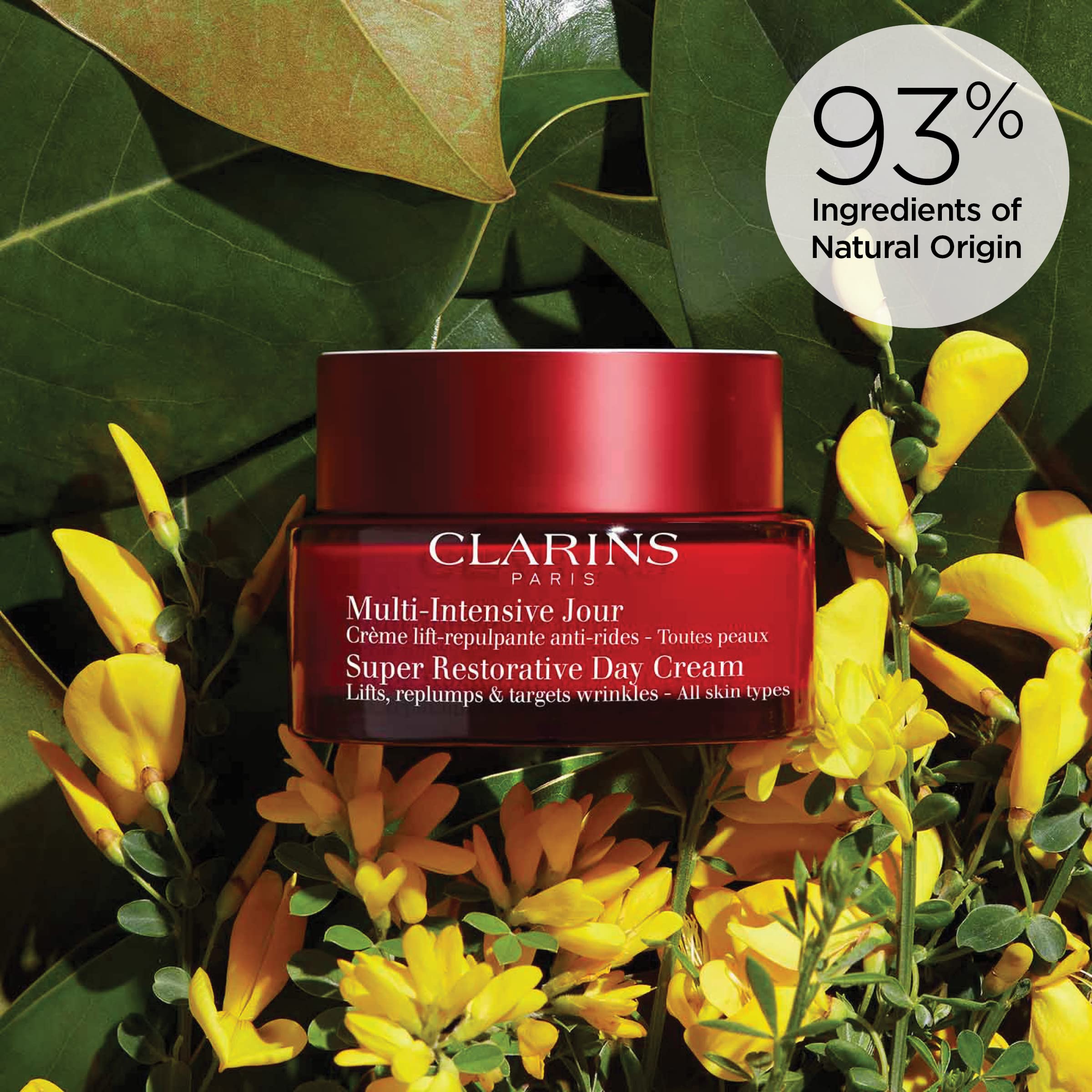 Clarins Super Restorative Day Cream on neck area indicates lifting and firming focus.