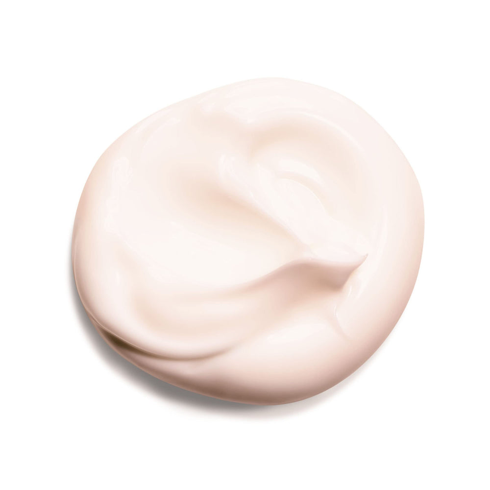 Clarins Super Restorative Hand Cream texture on skin for immediate smoothing and hydration.