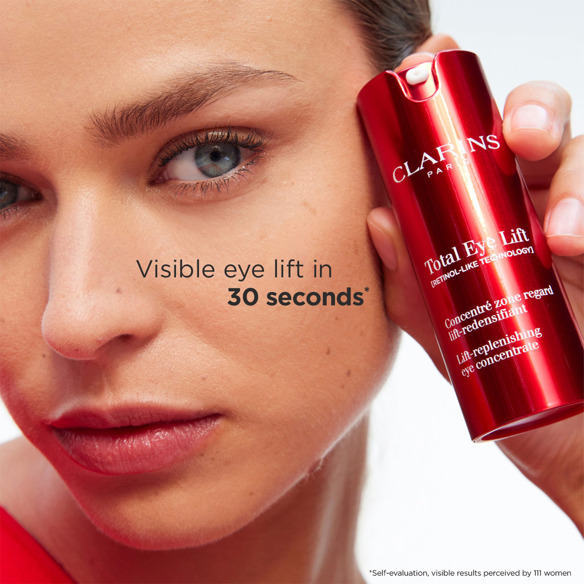 Clarins Total Eye Lift finger-tap under-eye, distributes formula evenly without pulling