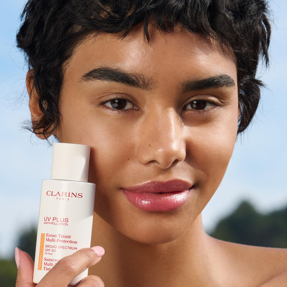 Clarins UV Plus texture on skin reveals breathable, non-greasy finish ideal under makeup.