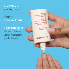 Clarins UV Plus tinted swatch shows medium shade with natural tint and sun protection.