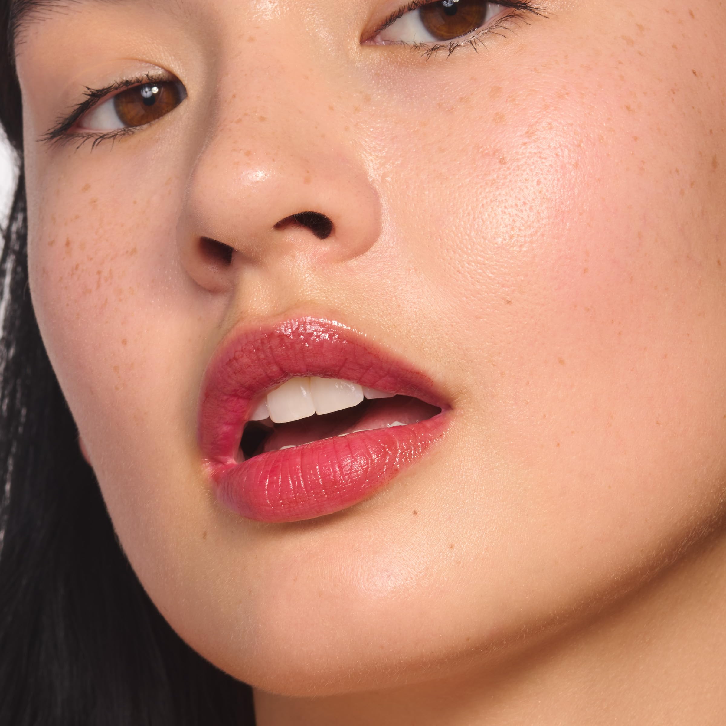 Clarins Water Lip Stain applicator demonstrating easy color transfer.