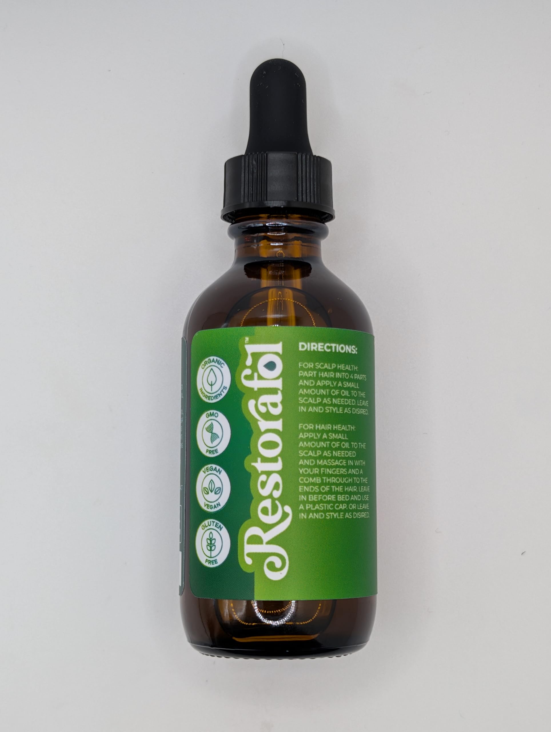 Clean Beauty Rosemary Hair Oil ingredient close-up features rosemary.