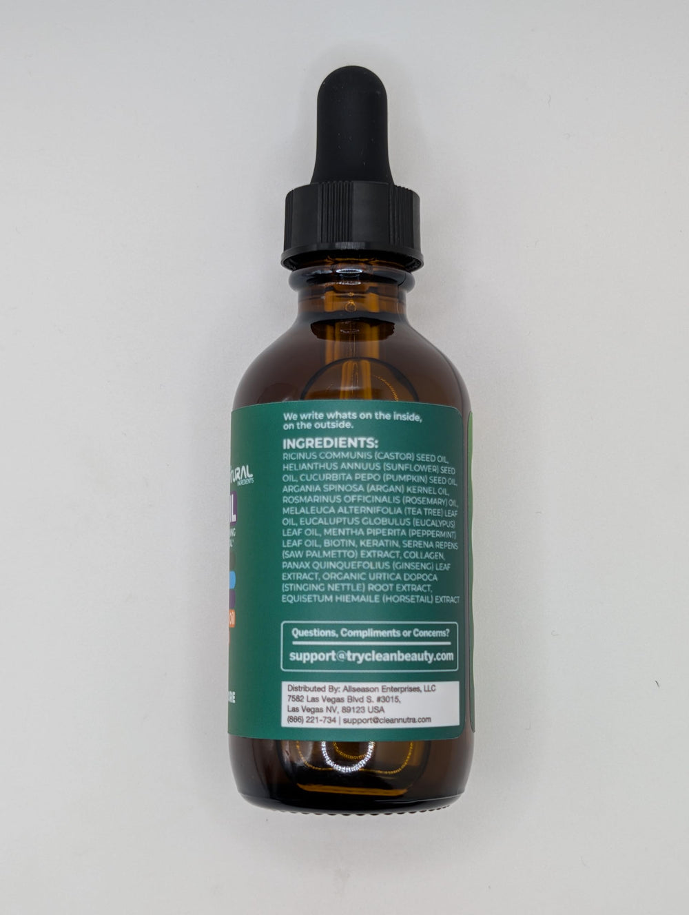 Clean Beauty Rosemary Hair Oil packaging conveys premium quality.