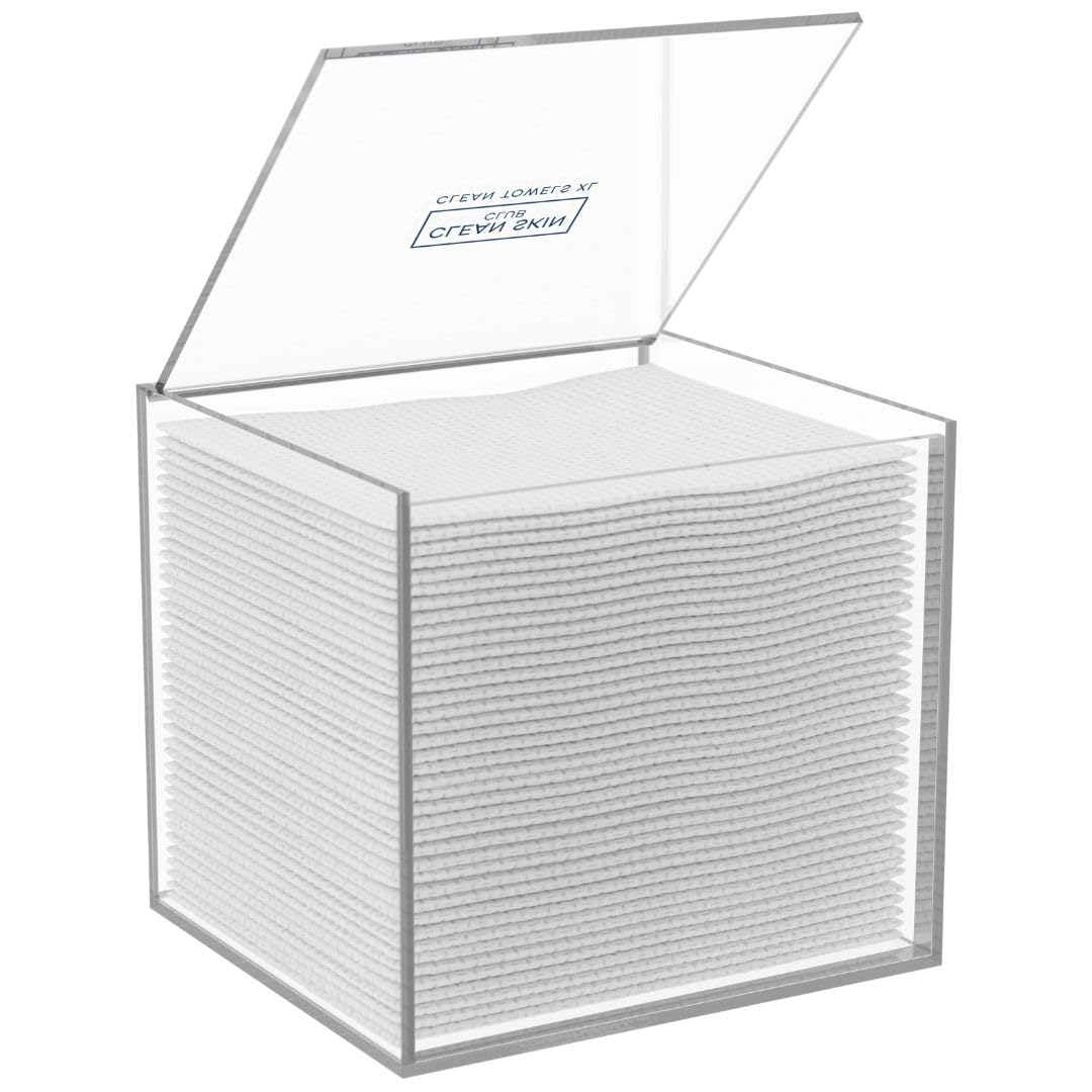 CLEAN SKIN CLUB clear acrylic box holding 50 towels XL for organized vanity.