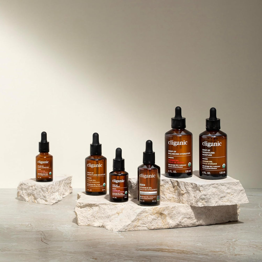 Cliganic almond oil glass bottle with palm demonstrates gentle, versatile skin care