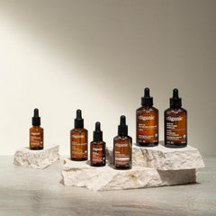 Cliganic almond oil glass bottle with palm demonstrates gentle, versatile skin care