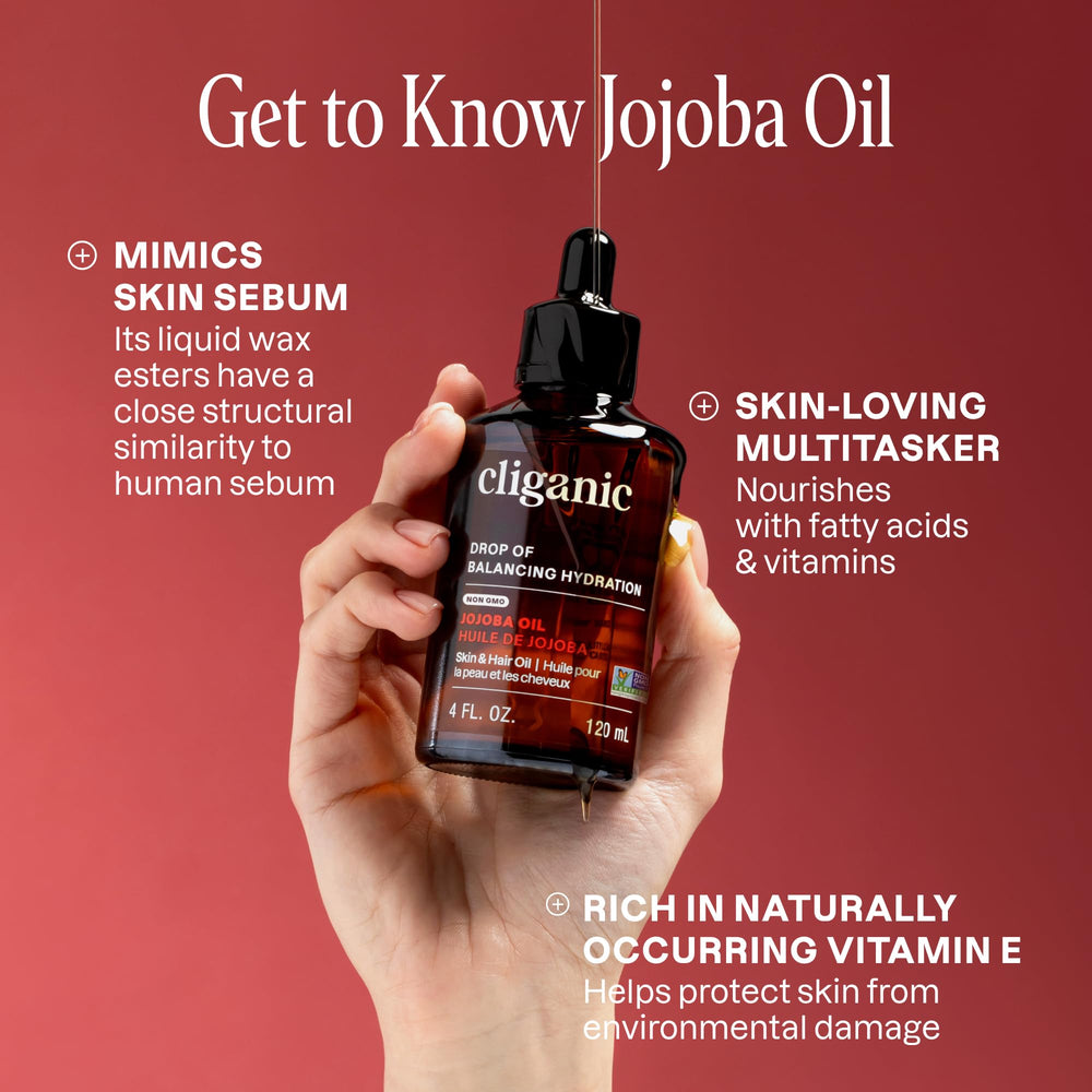 Cliganic Jojoba Oil label closeup highlighting organic, single-ingredient formula.