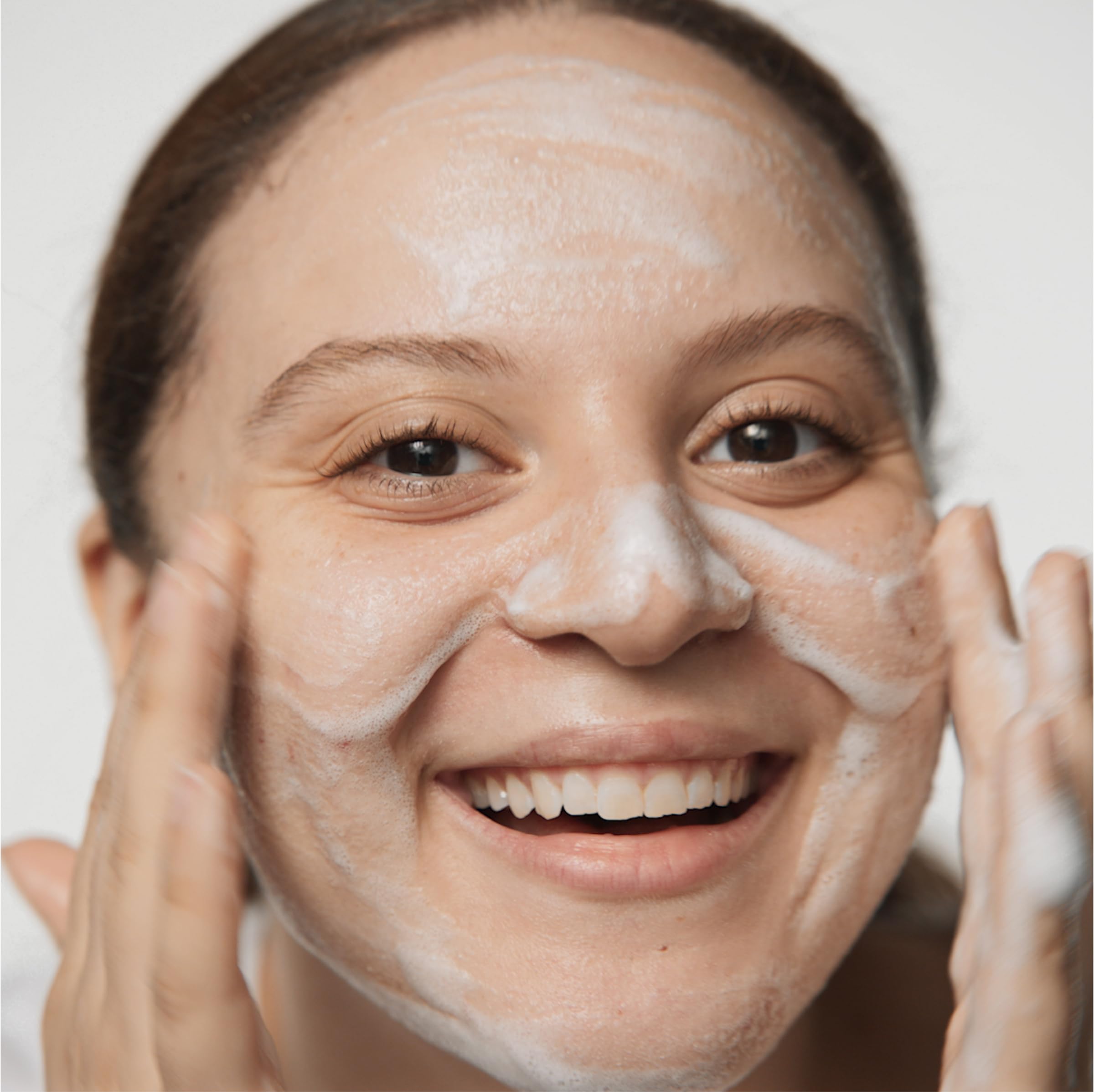 Mini travel size Clinique Acne Solutions cleanser ideal for on-the-go routines.