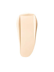 Creamy texture close-up of Clinique Acne Solutions Liquid Foundation for smooth blending.