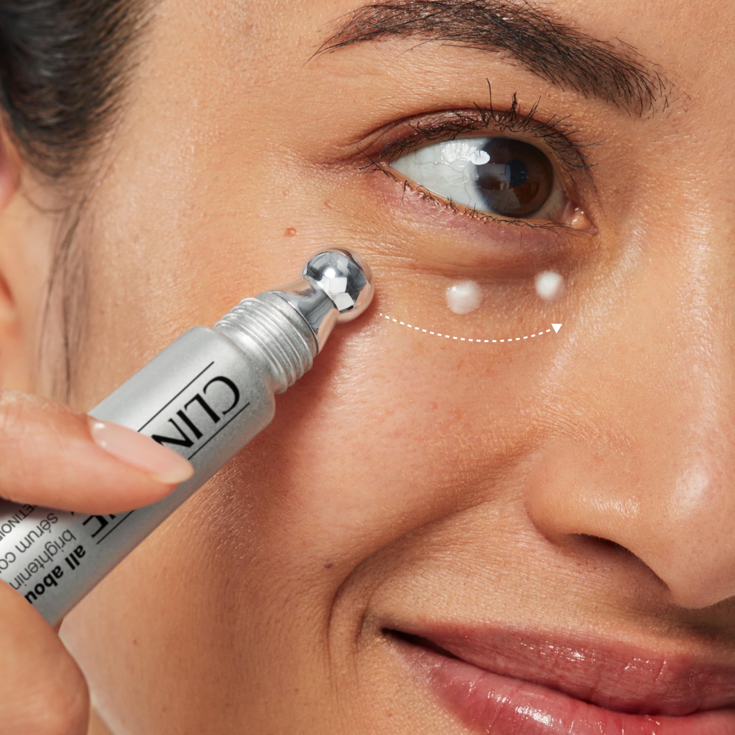 Clinique All About Eyes Brightening Serum Concentrate applicator showing precise under-eye targeting.
