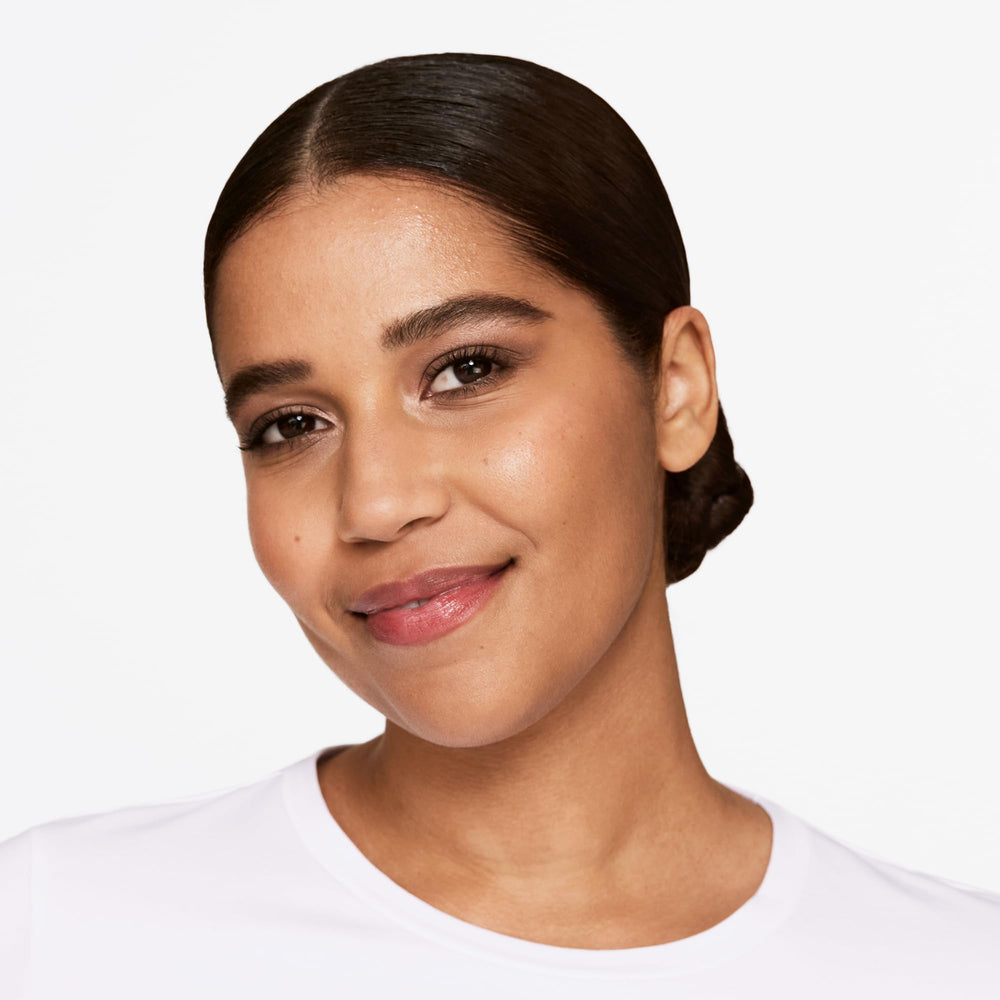 Clinique All About Shadow mirrored compact with a dual-ended sponge applicator.