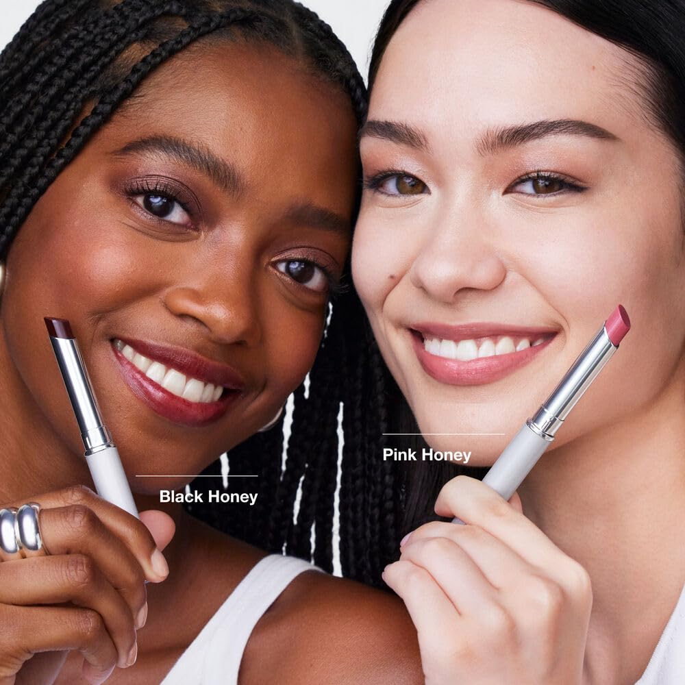 Clinique Almost Lipstick Pink Honey being applied shows buildable color benefits.