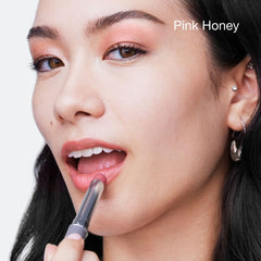 Clinique Almost Lipstick Pink Honey swatch on skin to compare shade warmth.