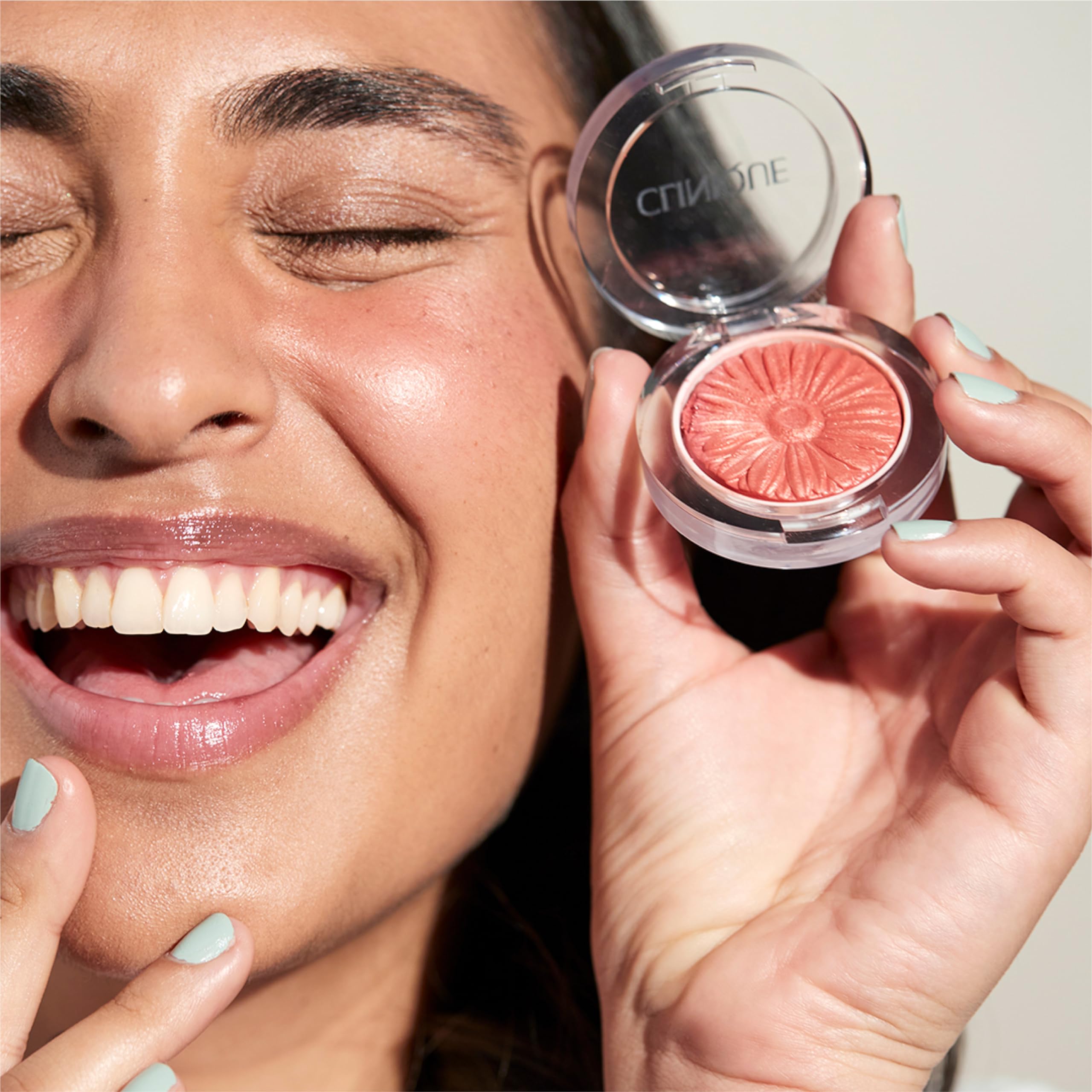 Clinique Cheek Pop Blush on apples of cheeks delivers natural, radiant flush.