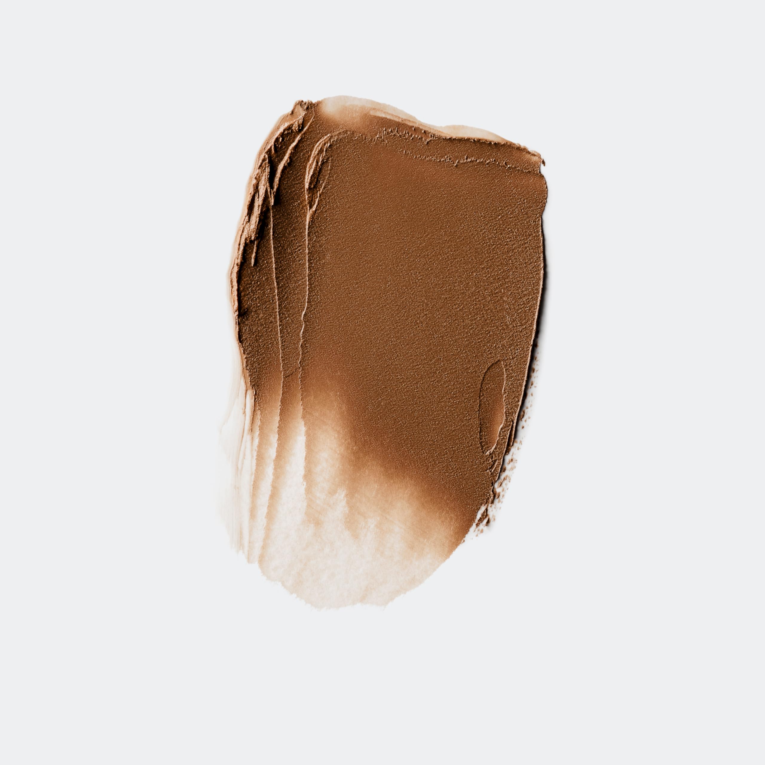 Clinique Chubby Stick Sculpting Contour defines the jawline with soft warmth.